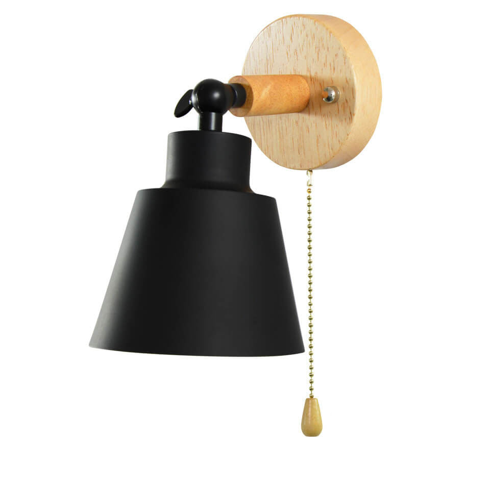 Wall-mounted light fixture with black shade, wooden pull chain, and wooden base on a white background