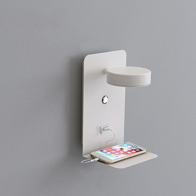 Wall-mounted charging station with a smartphone plugged in on a gray background