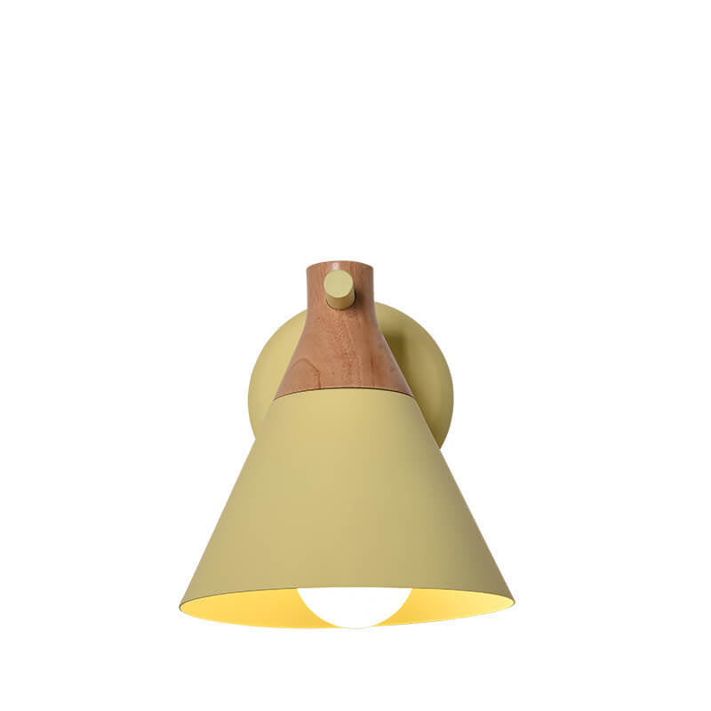 Wall-mounted light fixture with a wooden top and beige shade on a white background