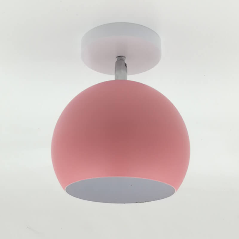 Pink ceiling light fixture on a white background