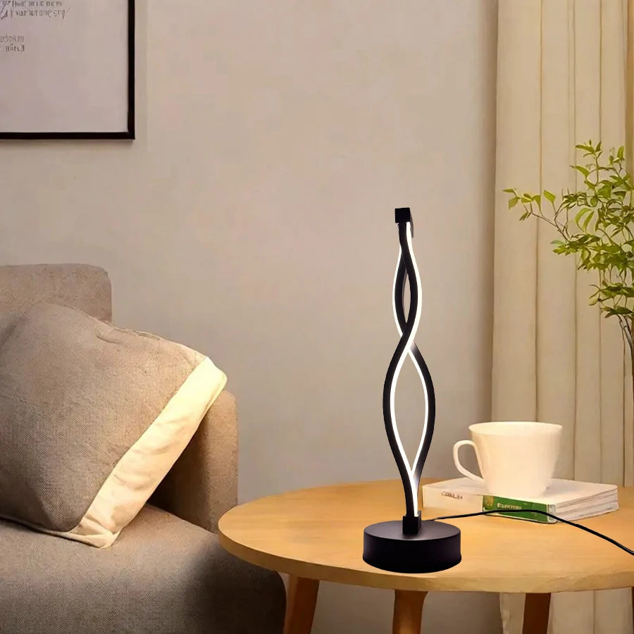 Modern table lamp on a wooden side table with a cozy living room setting.
