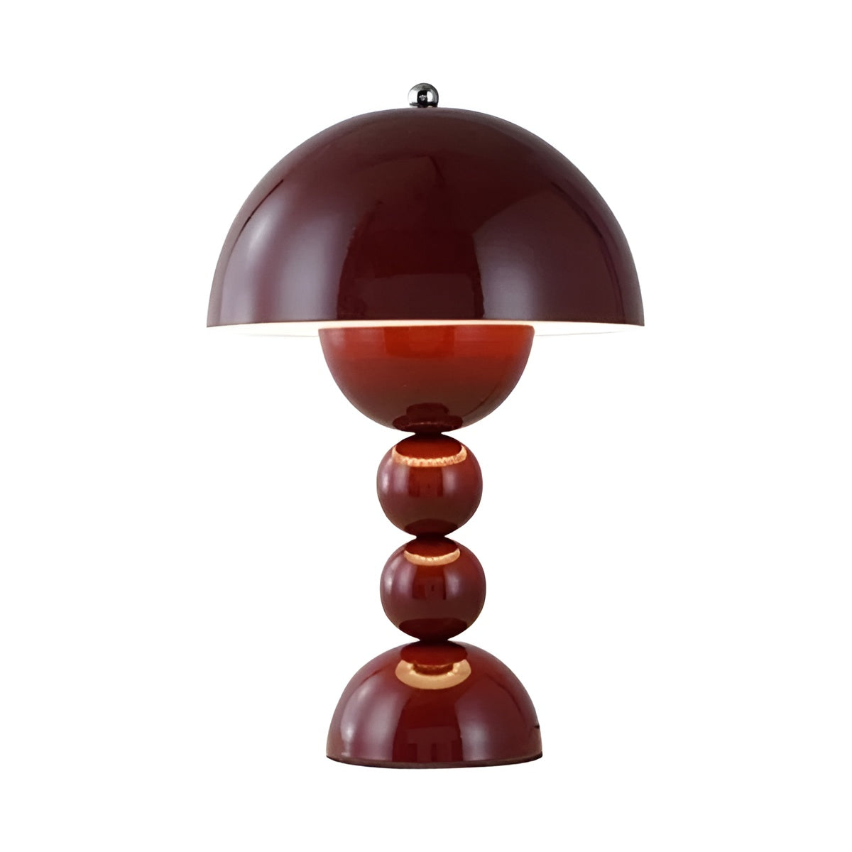 Red table lamp with a unique design on a white background
