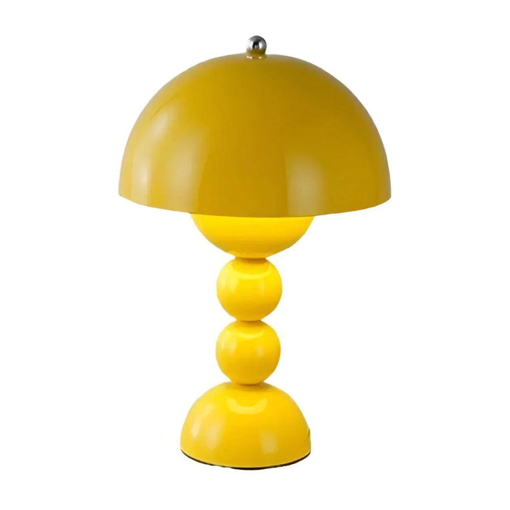 Yellow table lamp with a unique design on a white background