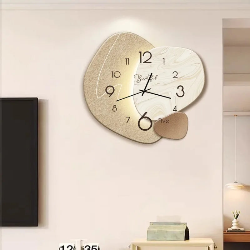 Decorative wall clock with leaf design on a wall