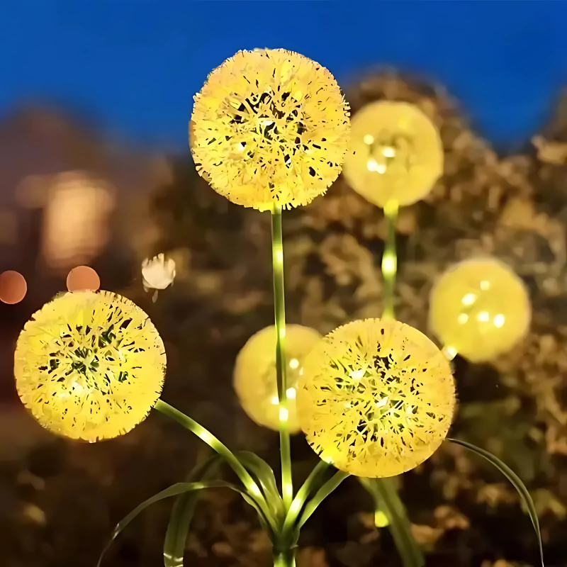 Decorative solar lights shaped like dandelions with a blurred natural background