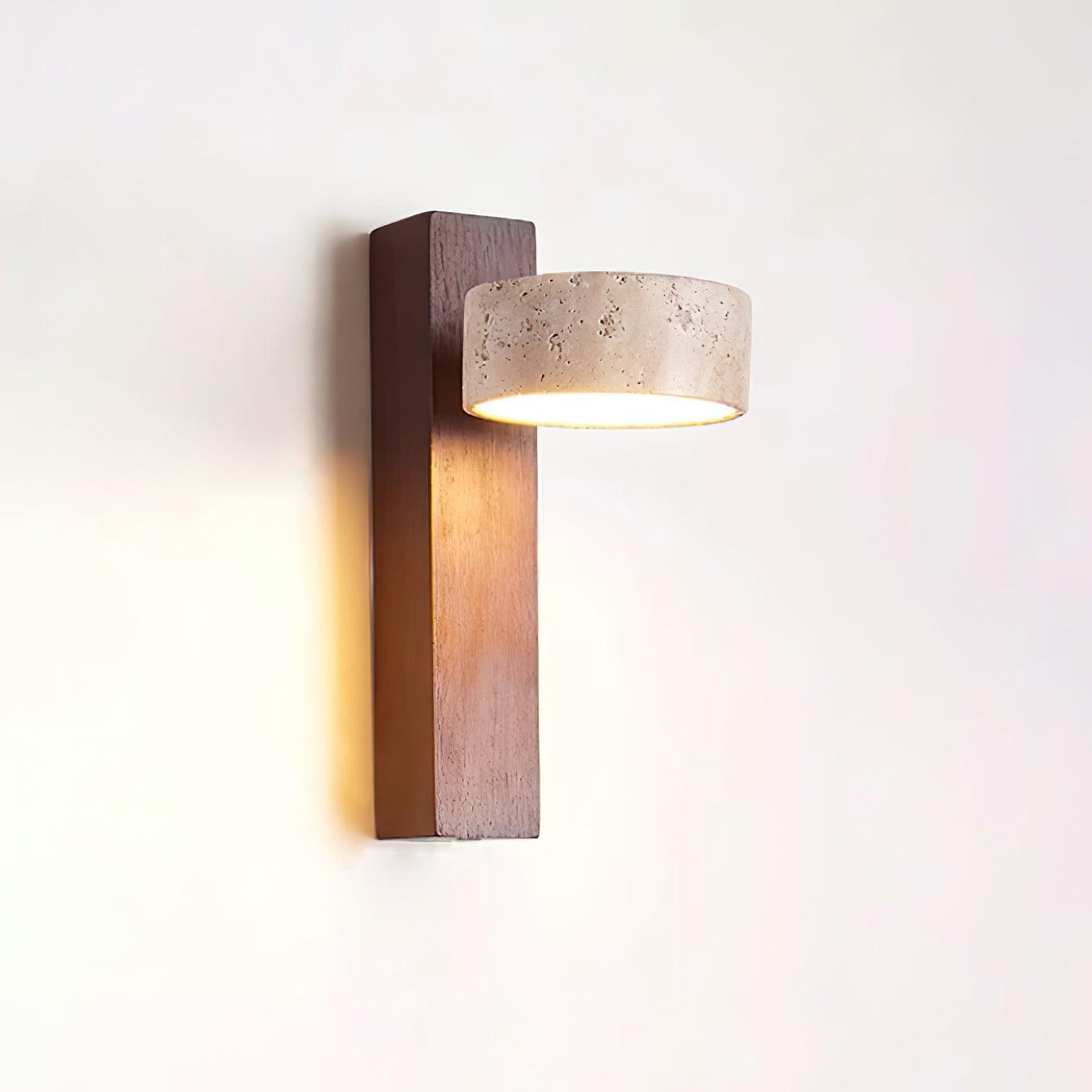 Wall-mounted light fixture with wooden base and concrete-like shade on a white background