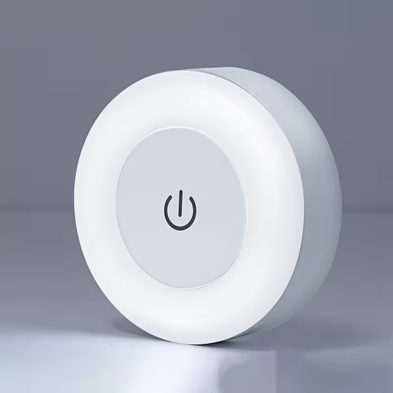 Round white light bulb with power symbol on a gray background