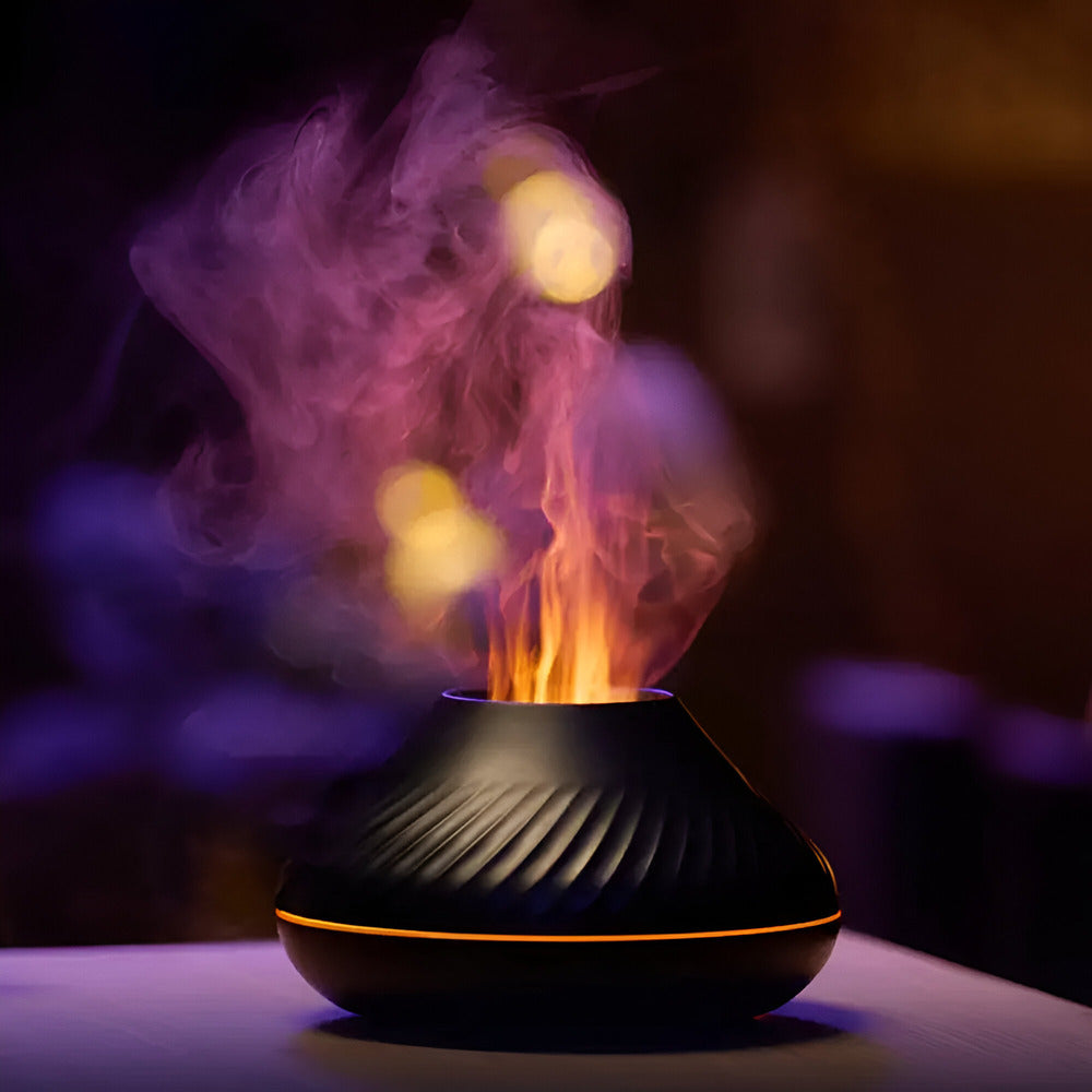 Black and orange diffuser emitting colorful smoke on a dark background