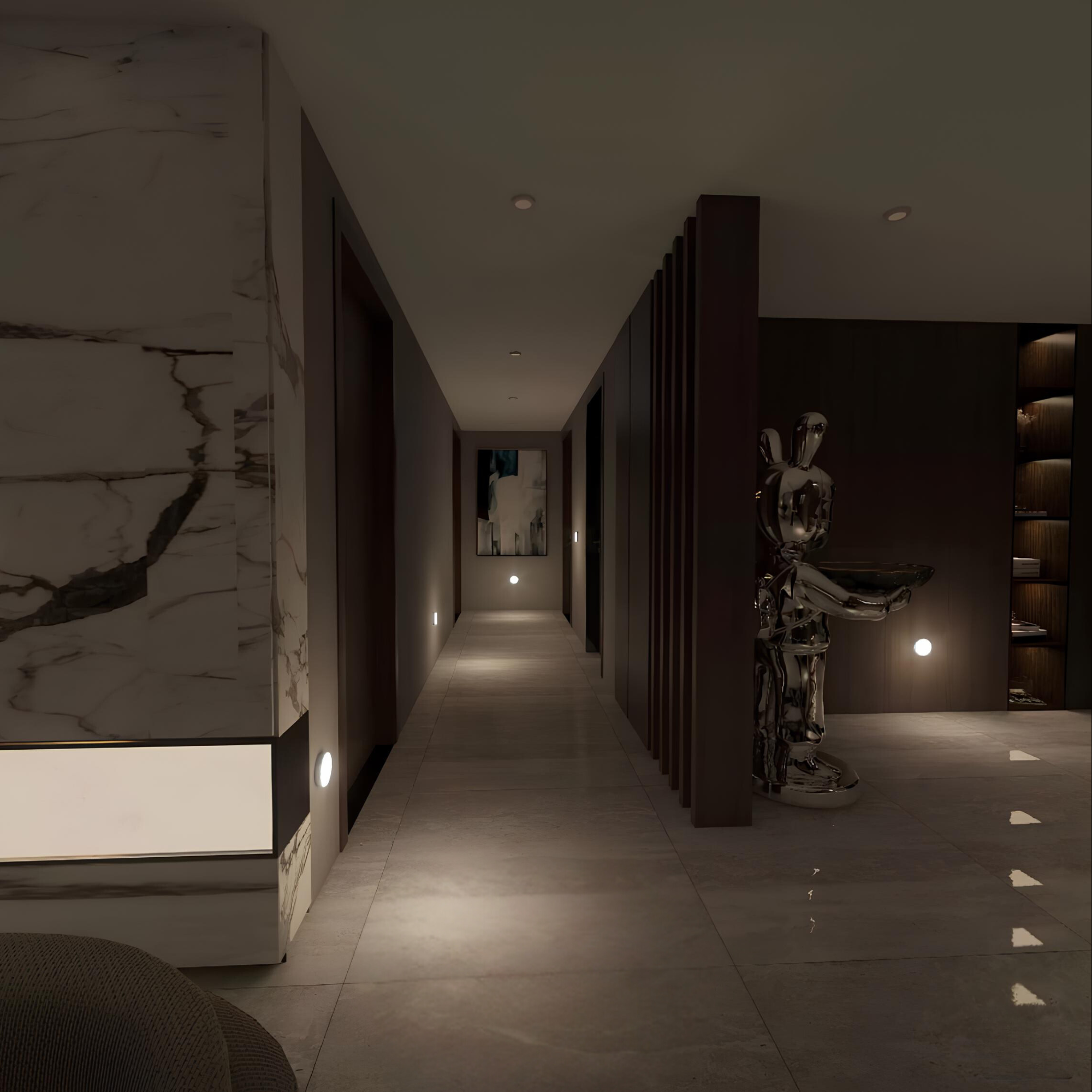 Modern hallway with marble wall and decorative sculpture