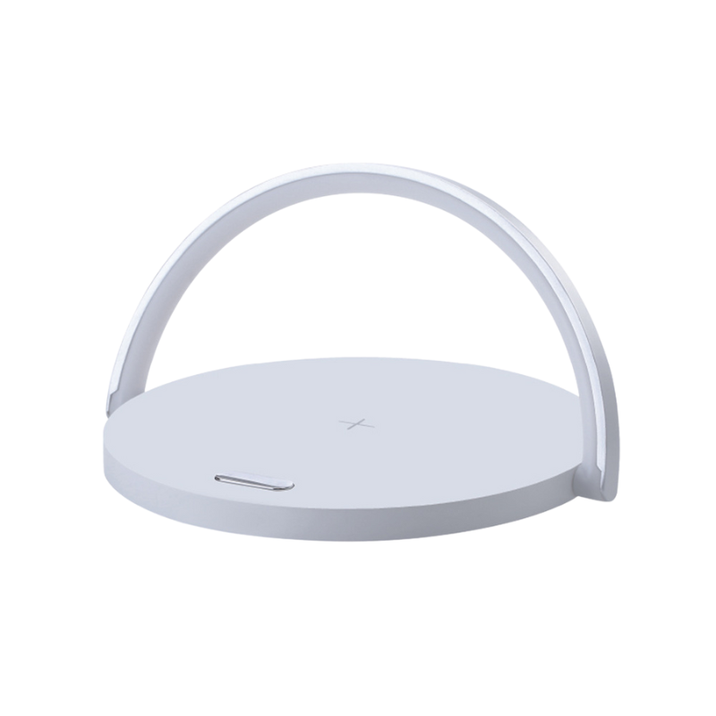White wireless charging pad on a white background