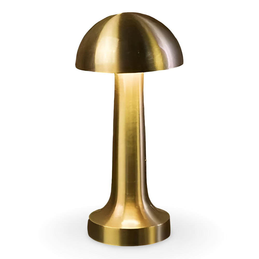 Gold table lamp with a white background