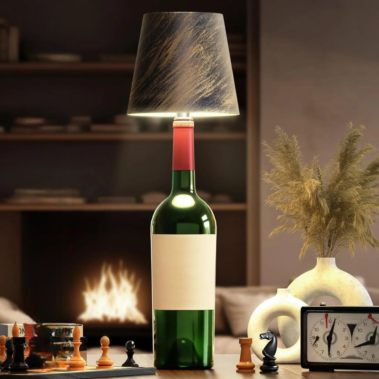 Wine bottle repurposed as a lamp with decorative elements on a table in a cozy room.