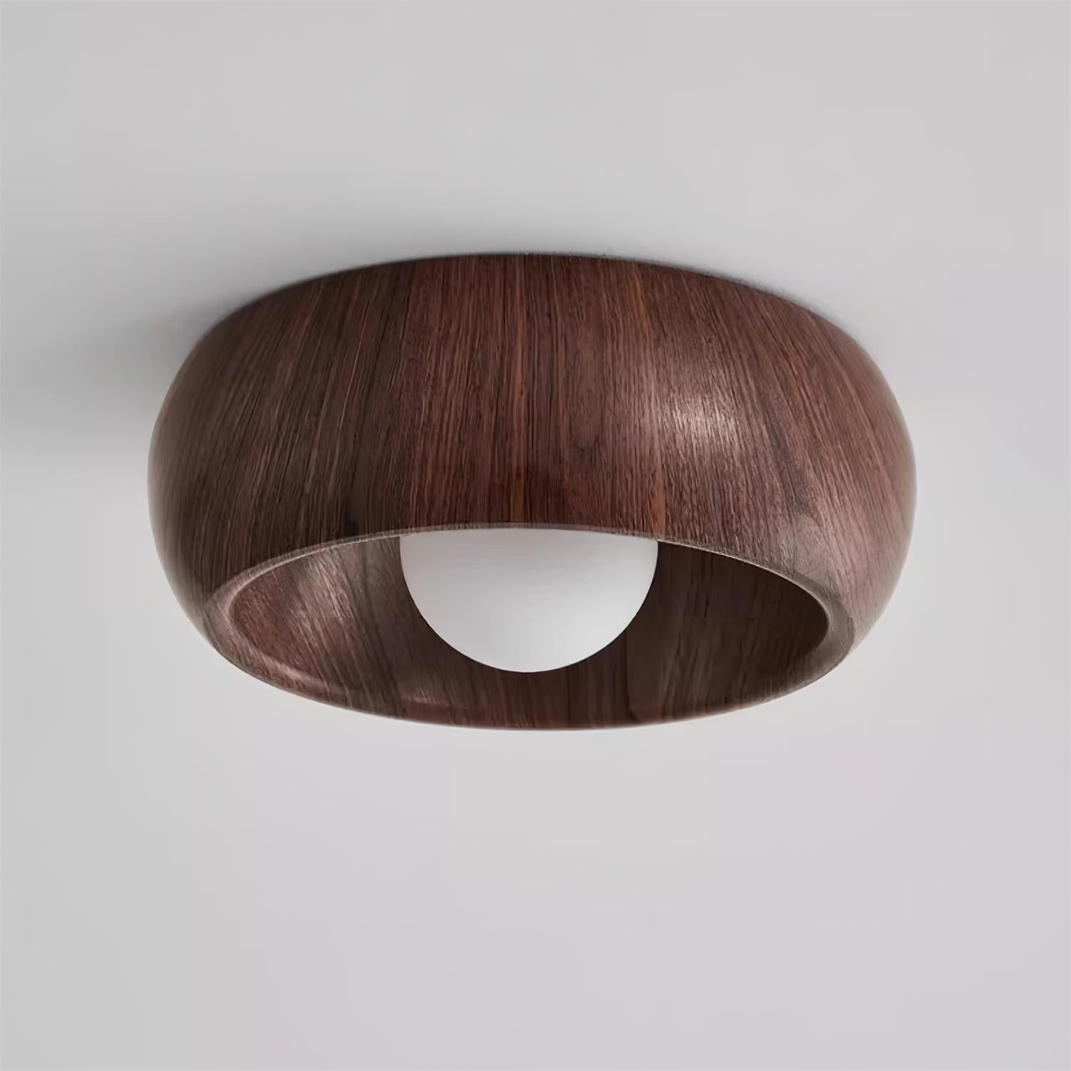 Wooden ceiling light fixture on a gray background