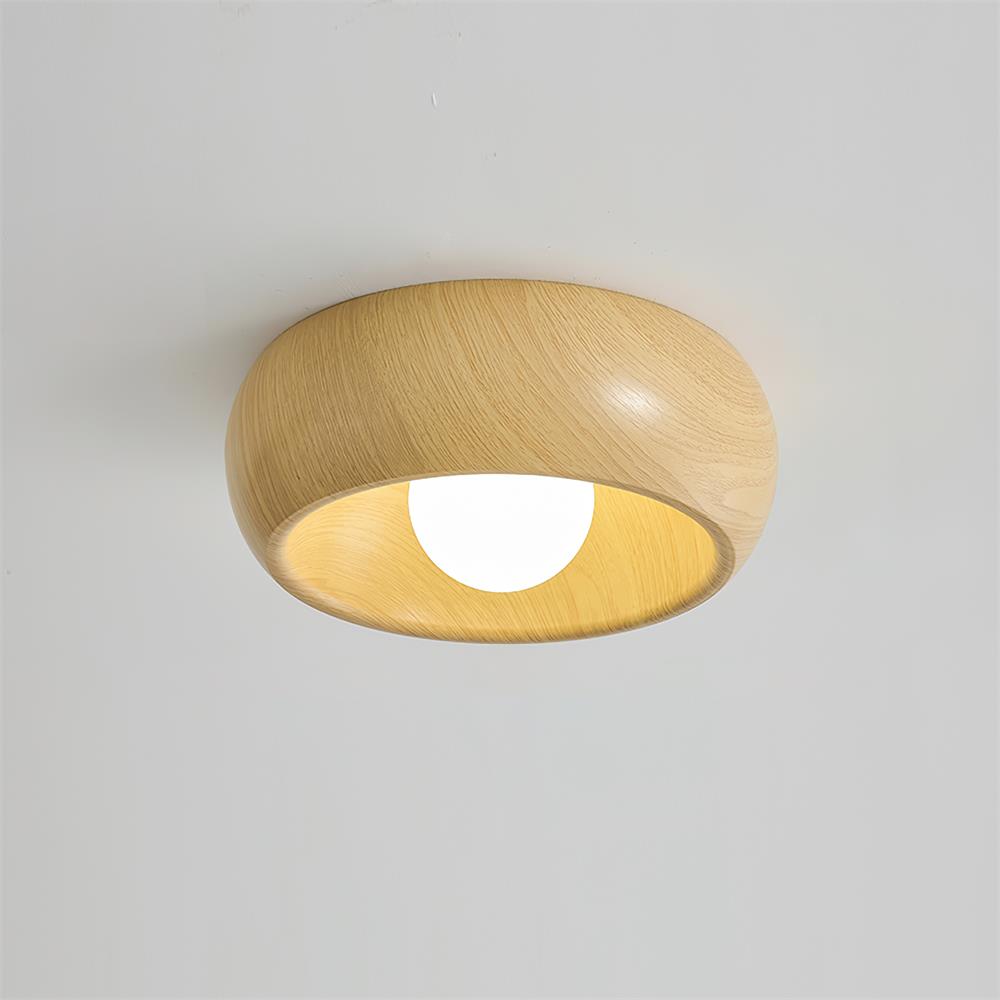 Wooden ceiling light fixture on a plain background