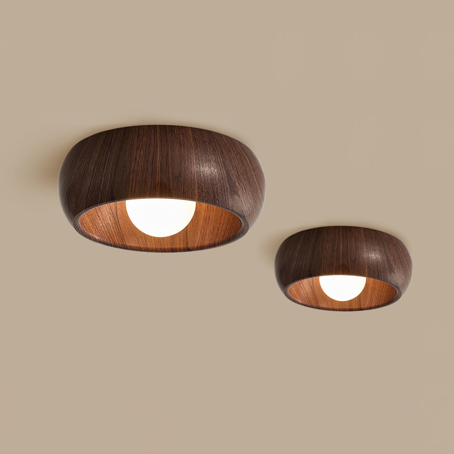 Two wooden ceiling lights on a beige wall