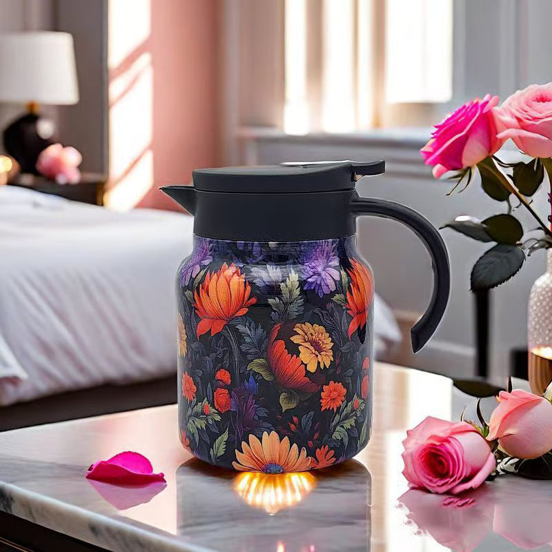 Floral-patterned thermos on a marble surface with pink roses and a blurred bedroom background