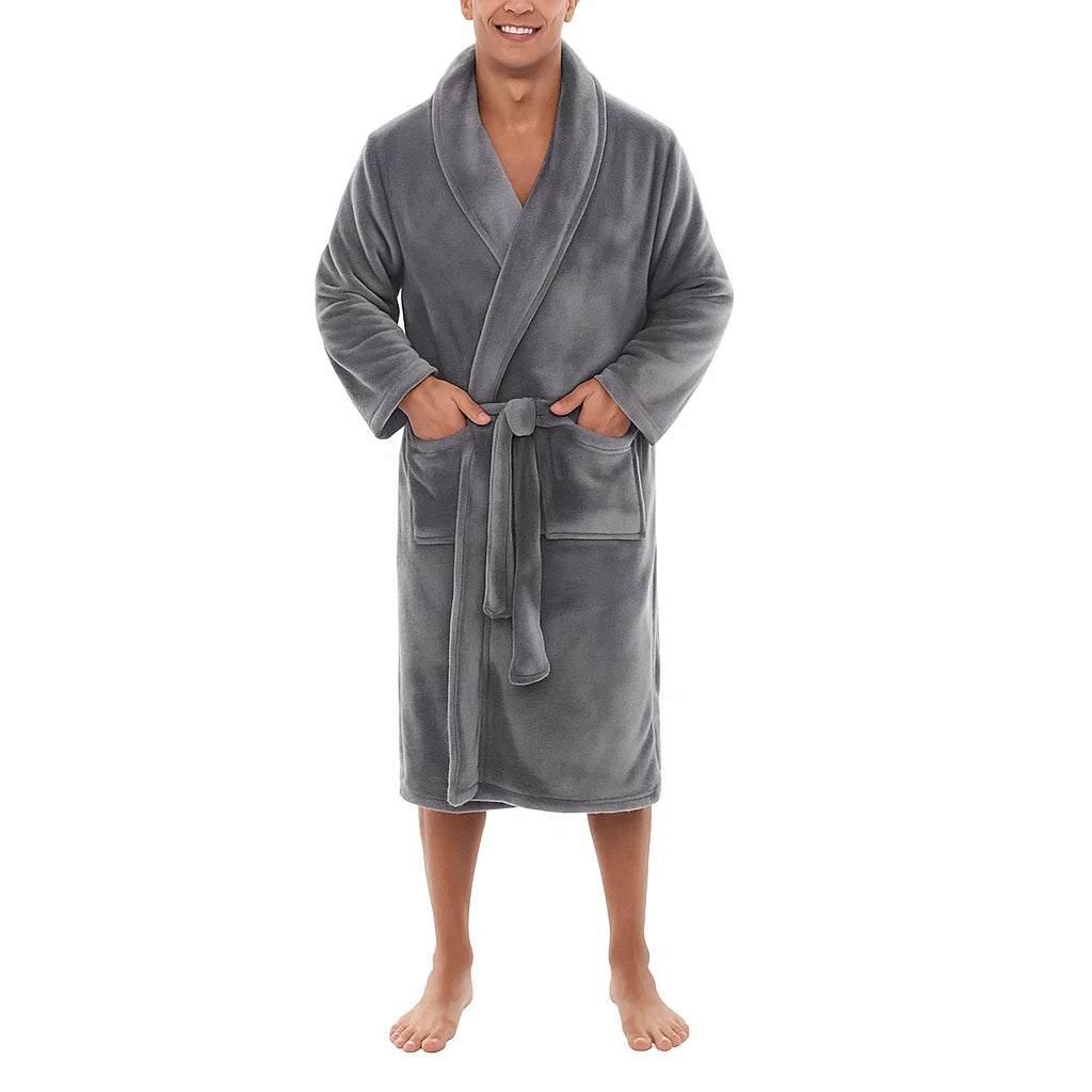 Man wearing a gray plush robe on a white background