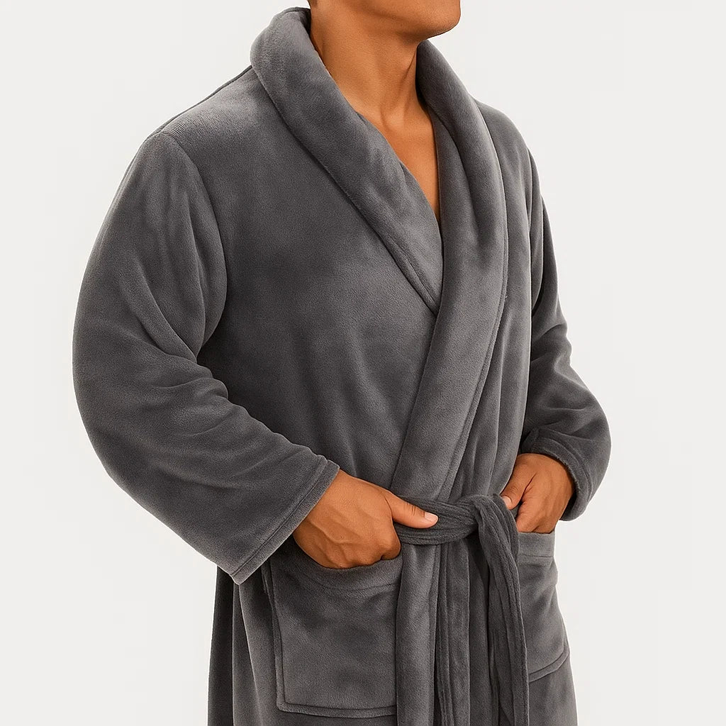 Person wearing a gray robe on a white background