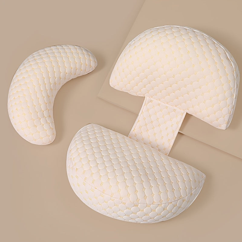 Three U-shaped pillows on a beige background