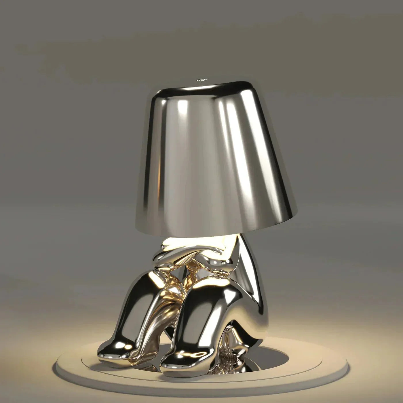 Metallic lamp with unique design on a gray background