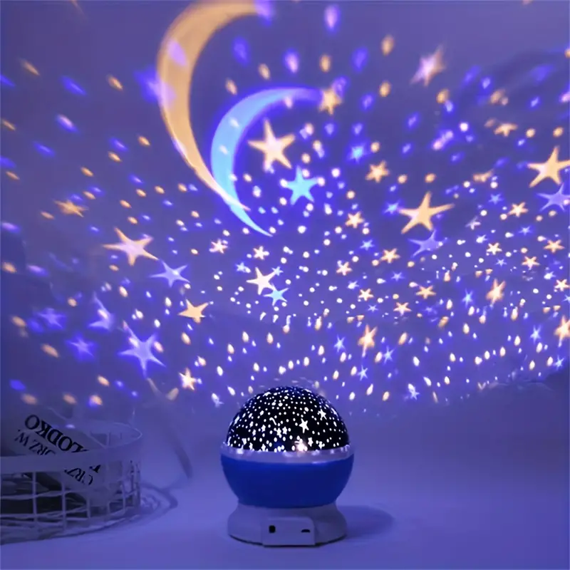 Starry night light projector emitting colorful stars and moon shapes on a dark background