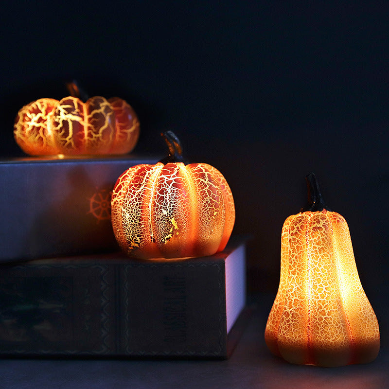 Decorative pumpkins with a textured, glowing surface on a dark background
