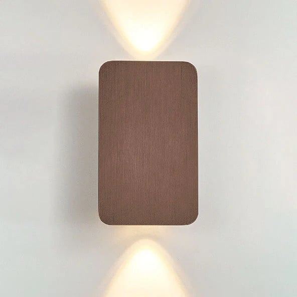 Square wall light fixture on a plain wall