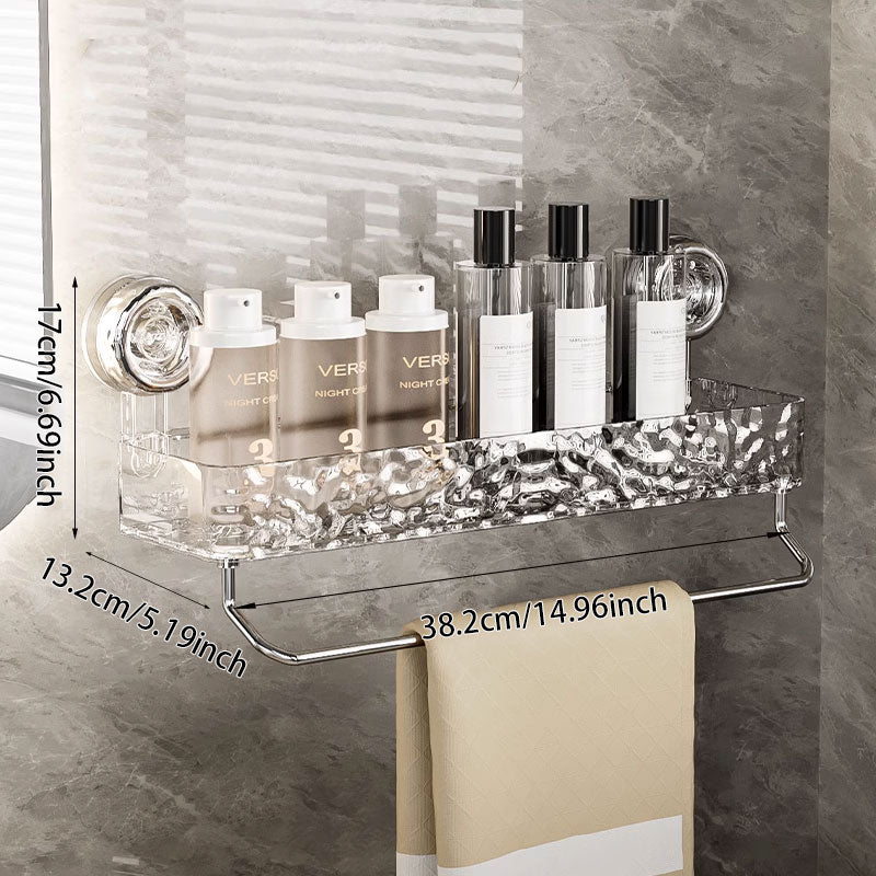Wall-mounted shelf with toiletries and dimensions labeled on a bathroom wall.