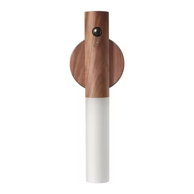 Wooden and white pepper grinder on a white background