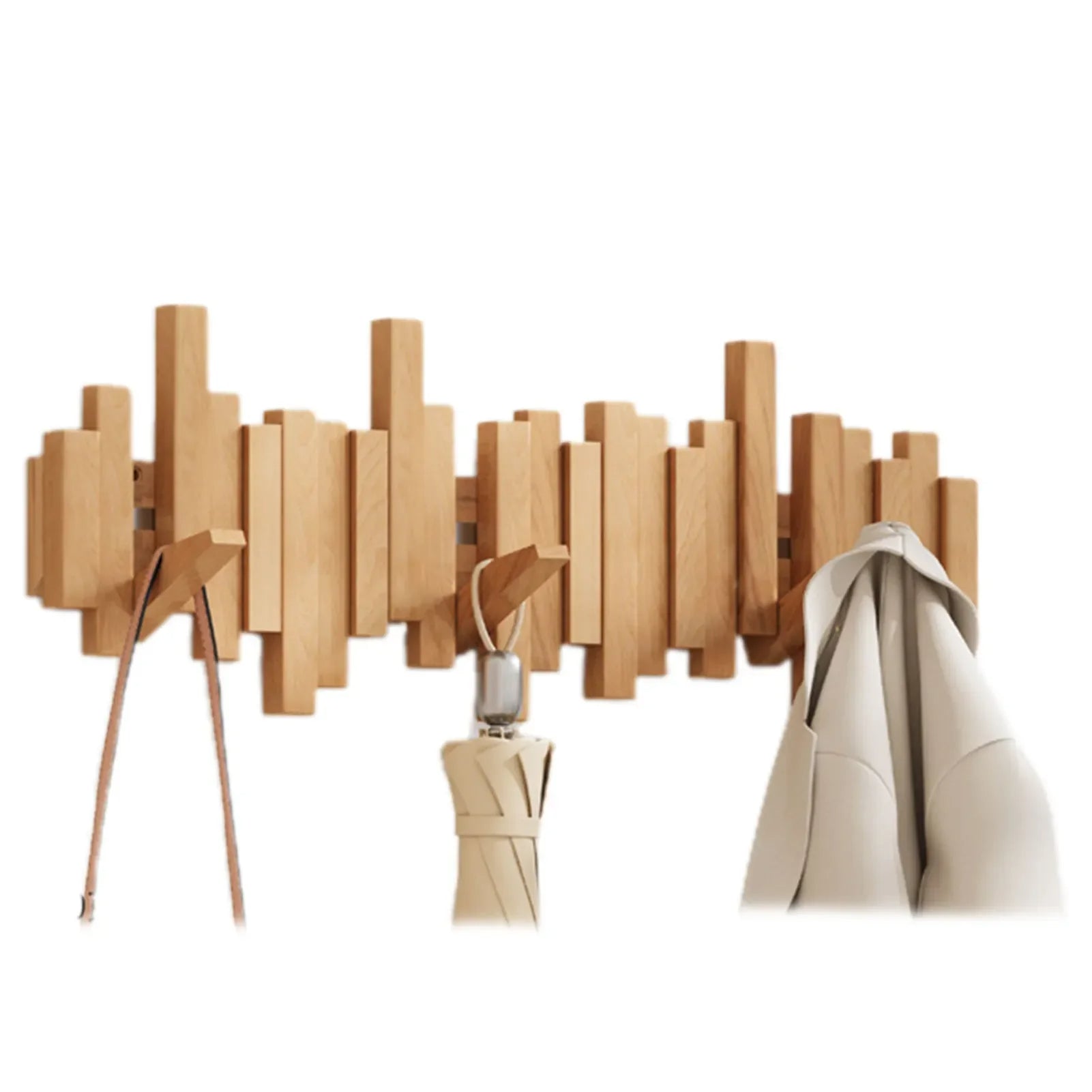 Wooden wall-mounted coat rack with hooks holding a coat and an umbrella on a white background