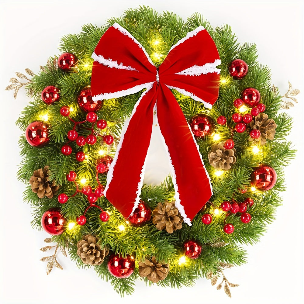 Christmas wreath with red bow, lights, and decorations on a white background