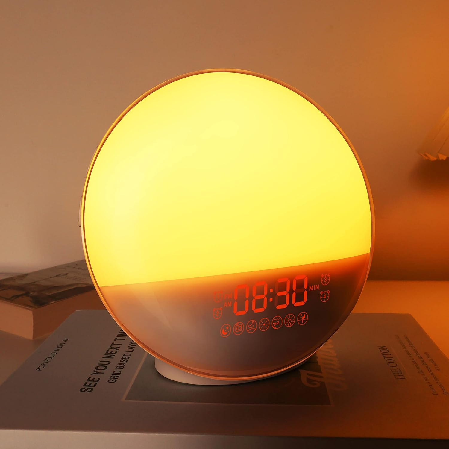 Round night light with digital display on a surface