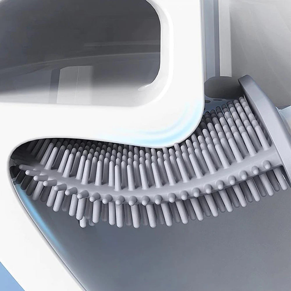Gray scrubber with bristles on a white background