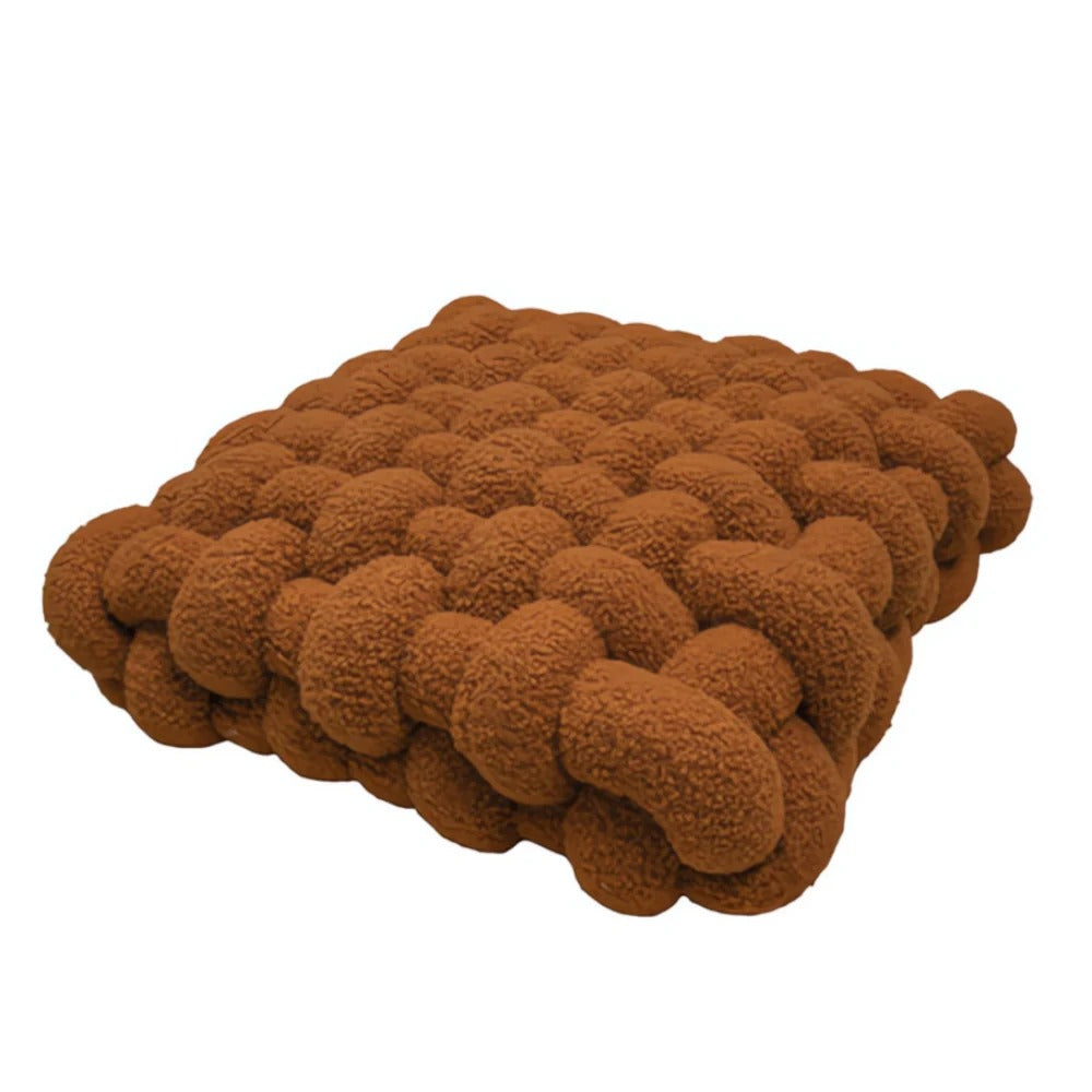 Brown textured blanket on a white background