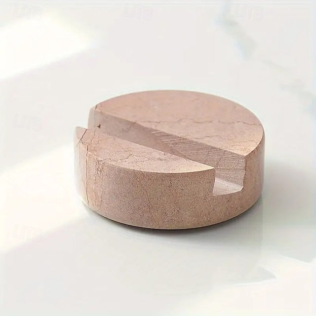 Round stone object on a white background