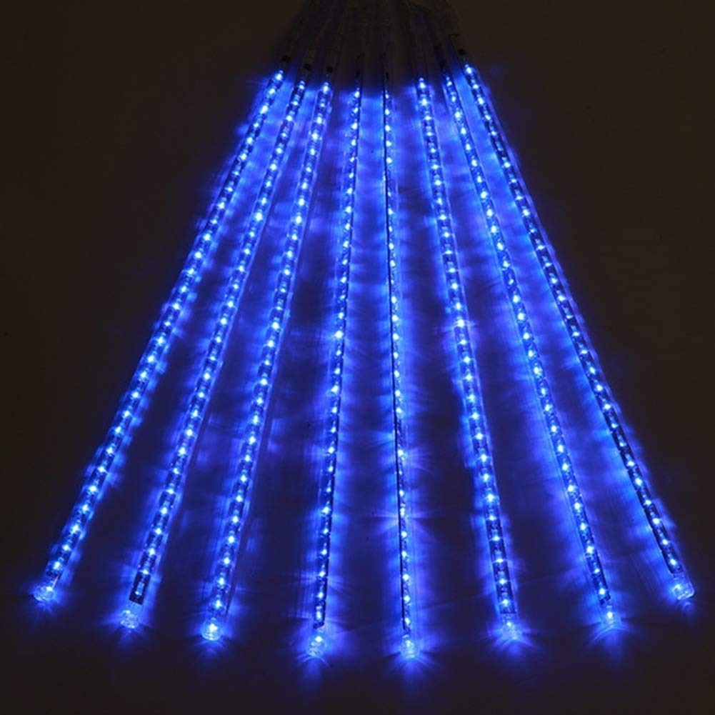 Blue LED curtain light against a dark background
