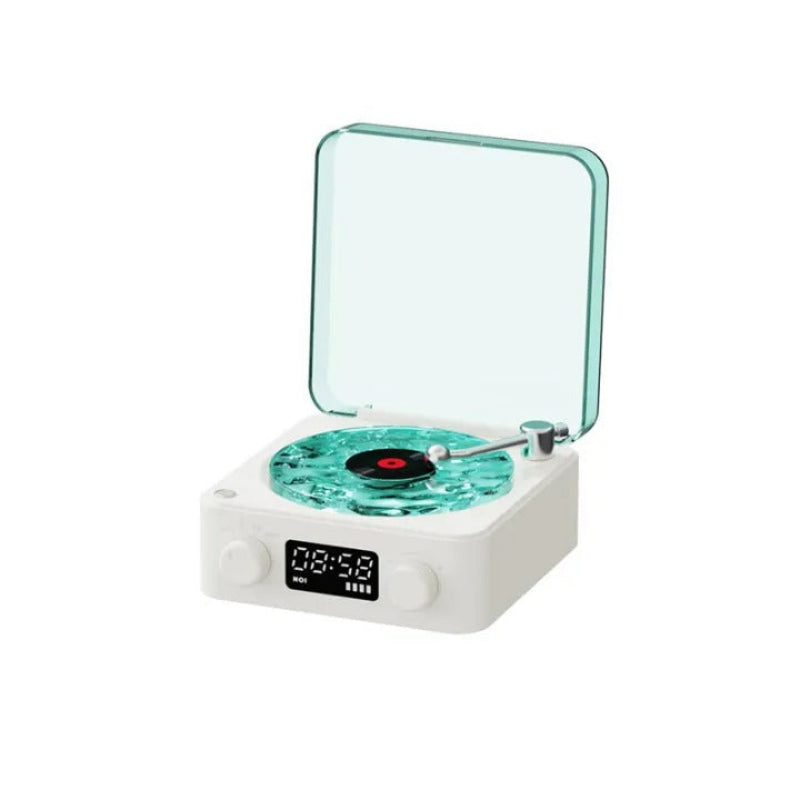 Small record player with a digital display on a white background