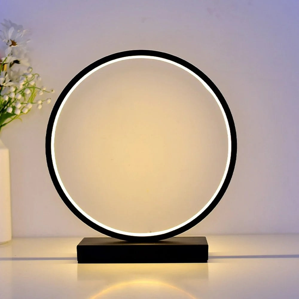 Modern table lamp with circular design on a neutral background