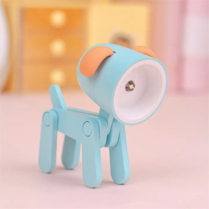 Blue and orange lamp shaped like a dog on a pink background