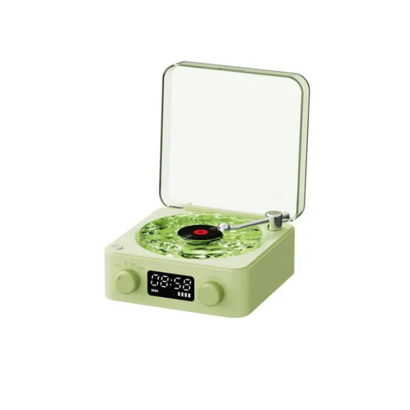 Green record player with digital display on a white background