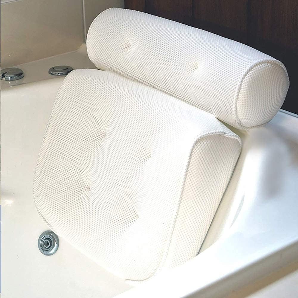 White mesh bath pillow on a bathtub