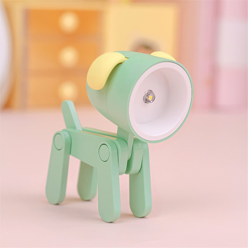 Pastel green and yellow lamp shaped like a dog on a soft pink background