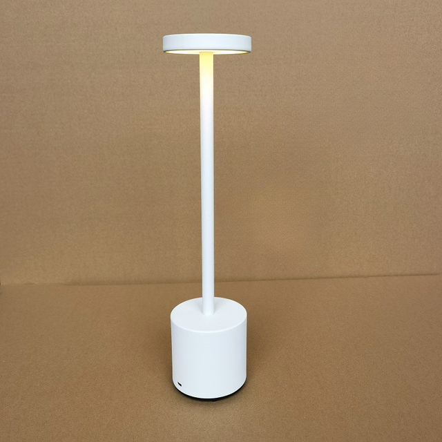 White floor lamp on a brown background
