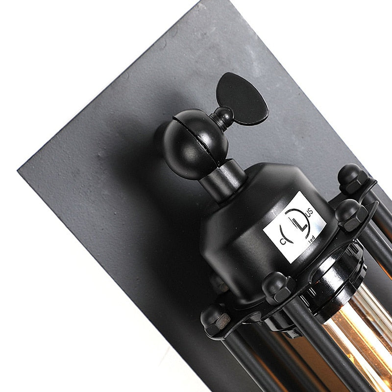 Black adjustable lamp stand on a gray background