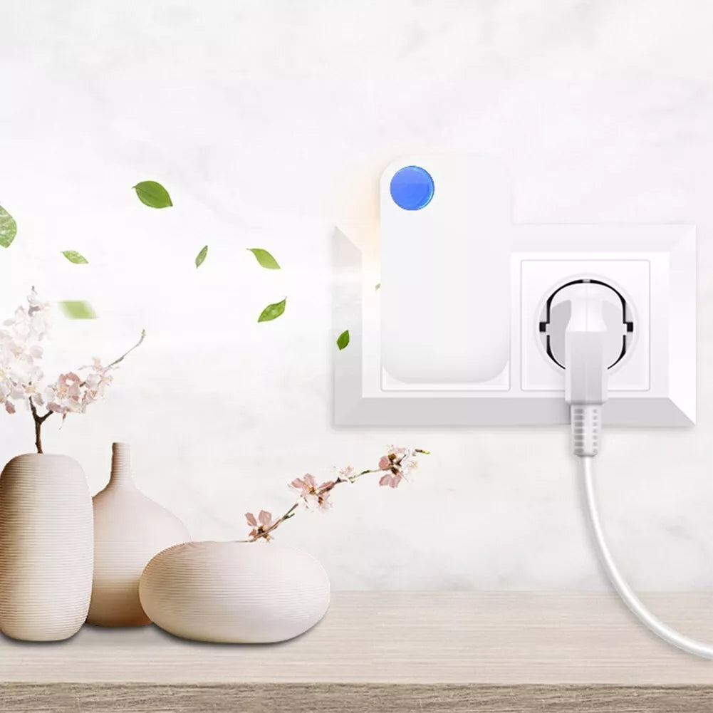 Smart home device with a plug and socket on a white wall with decorative elements.