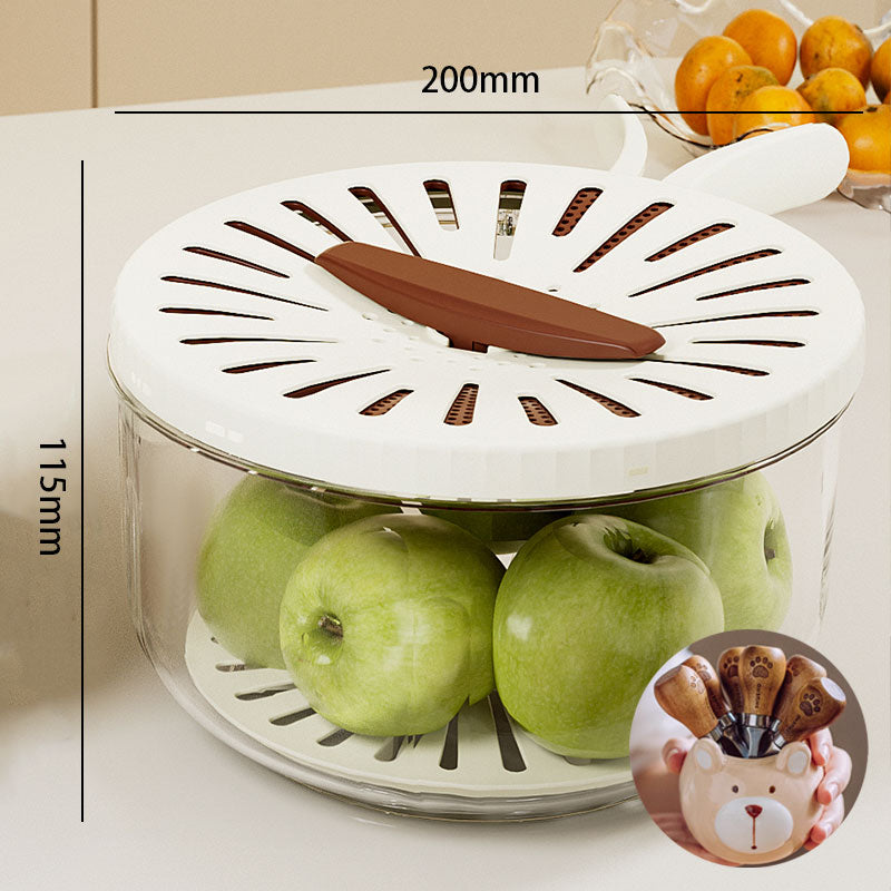 Fruit storage container with apples and a knife, labeled dimensions, and inset of product packaging.