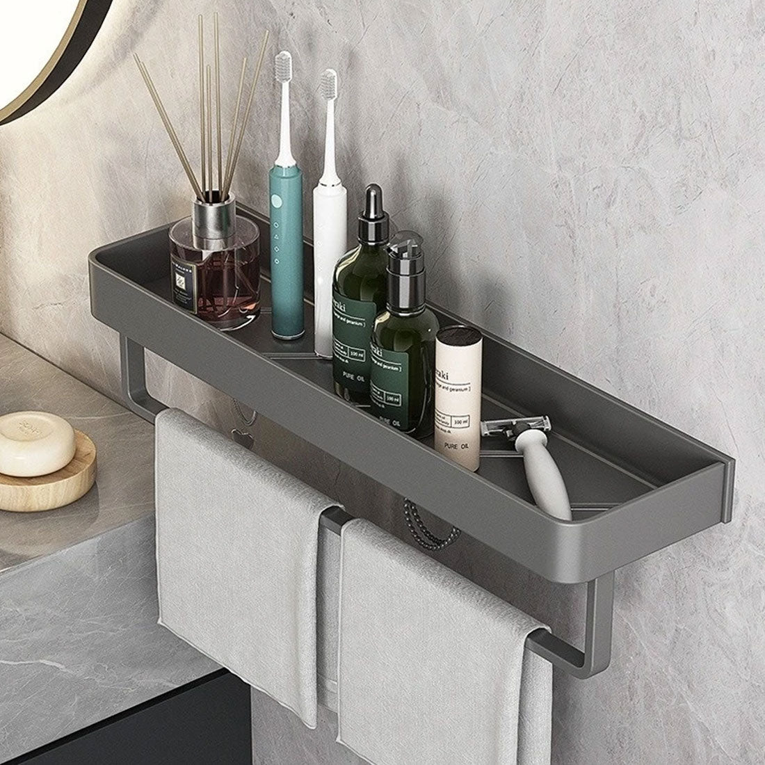 Bathroom shelf with toiletries against a gray wall