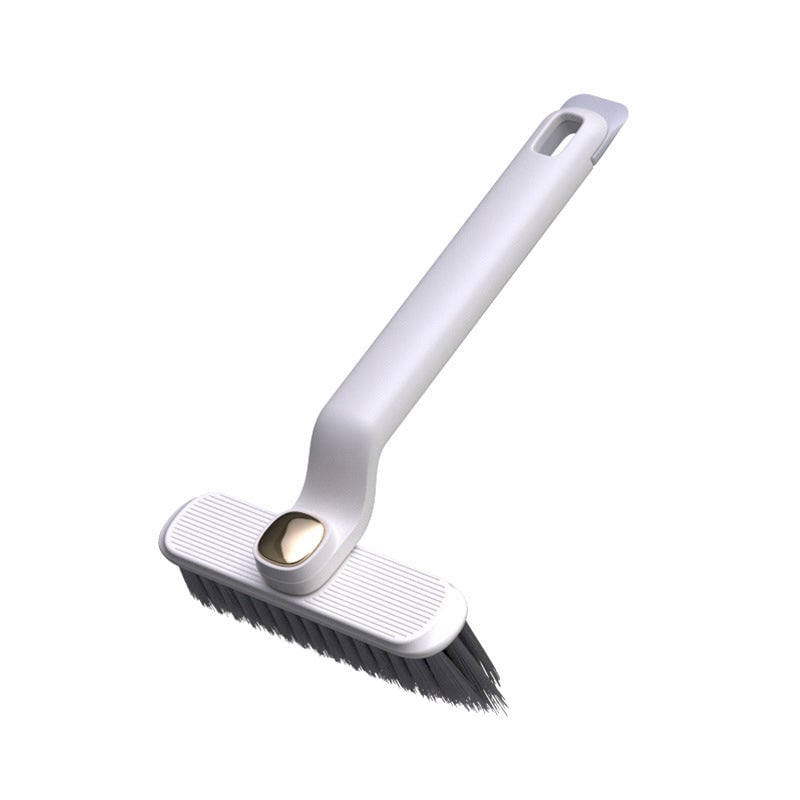 Cleaning brush with a white handle on a white background