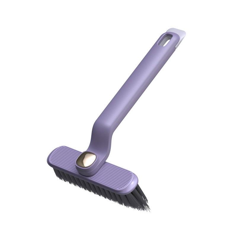 Purple brush with a handle on a white background
