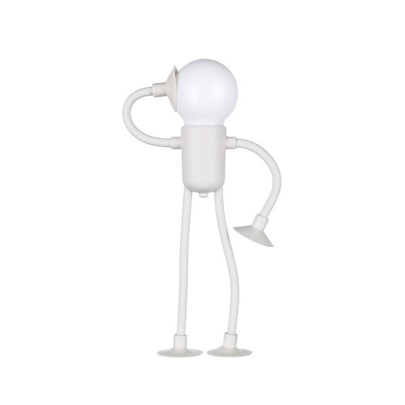 White lamp shaped like a stick figure on a white background